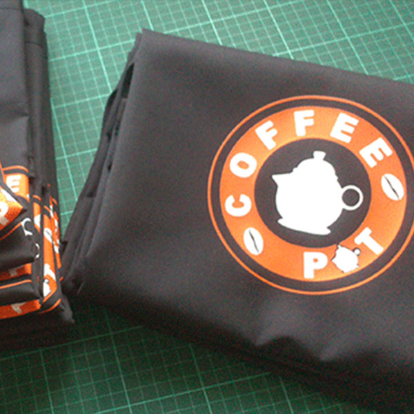 printed aprons for coffee pot luton